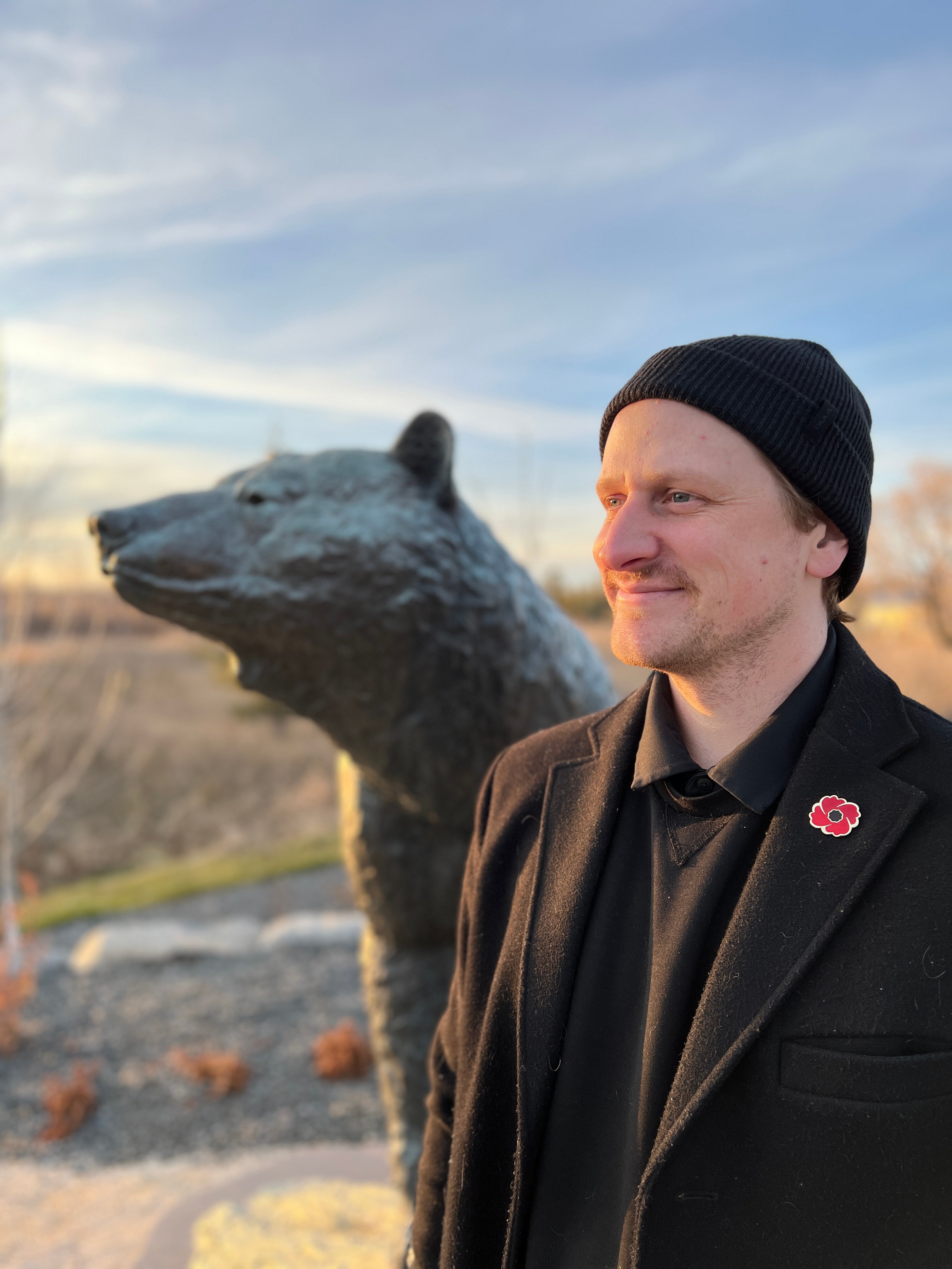 Nich with Makwa Statue